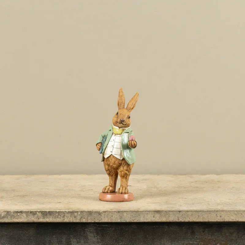 7.75-Inch Bunny Holding Egg Resin Figurine 1